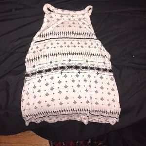 Tank top , white shirt with design in black